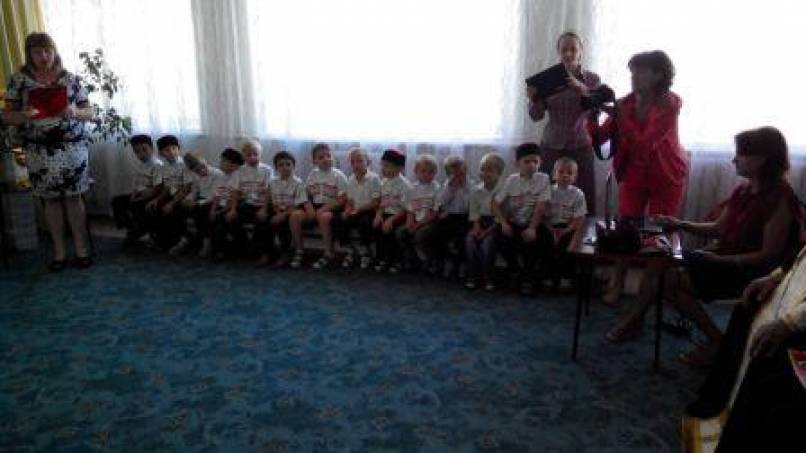 Фотоотчет «Посвящение в казачата воспитанников ДОУ»