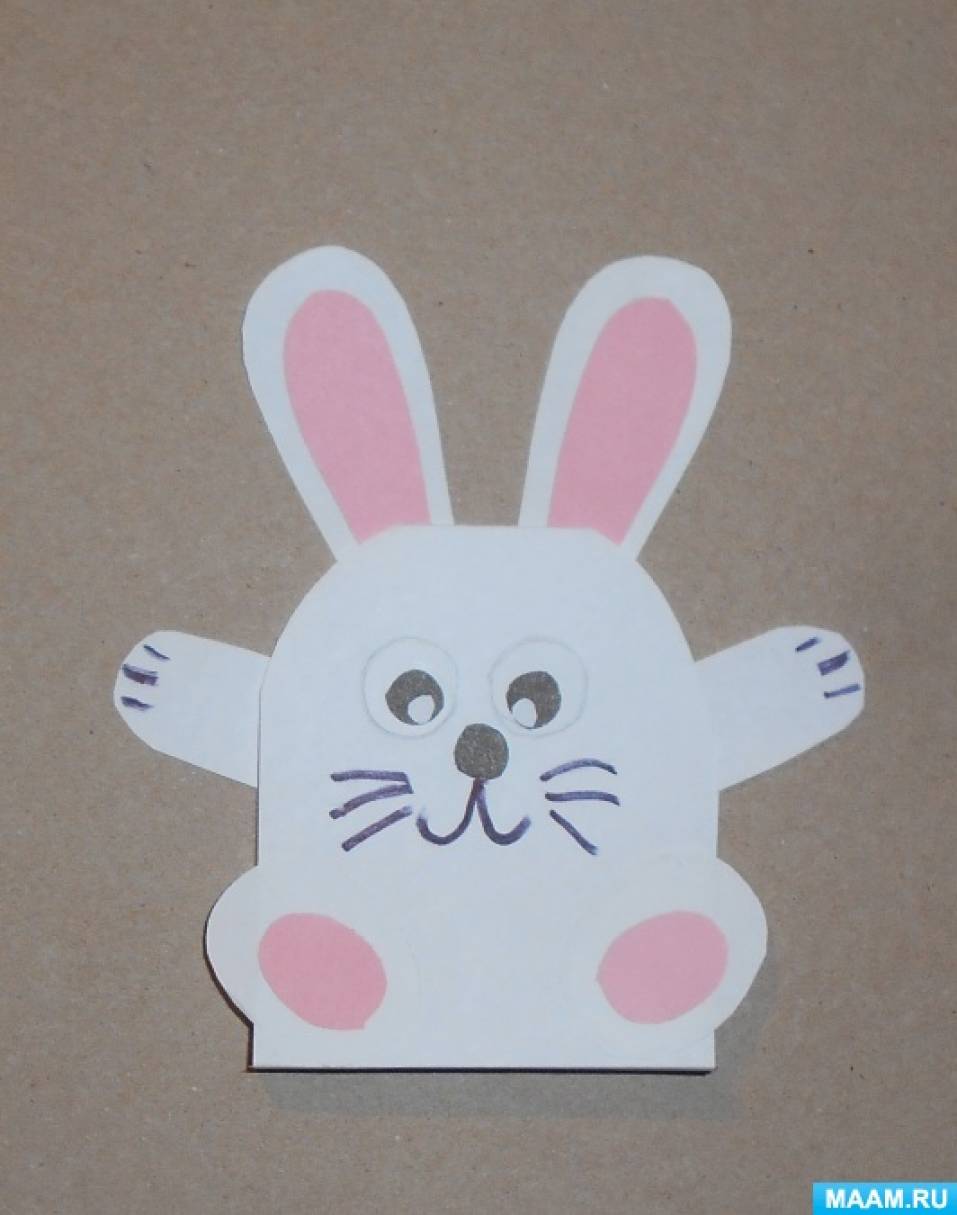 Фото №9 Дети по показу и словесной инструкции воспитателя конструируют зайчика из бумаги