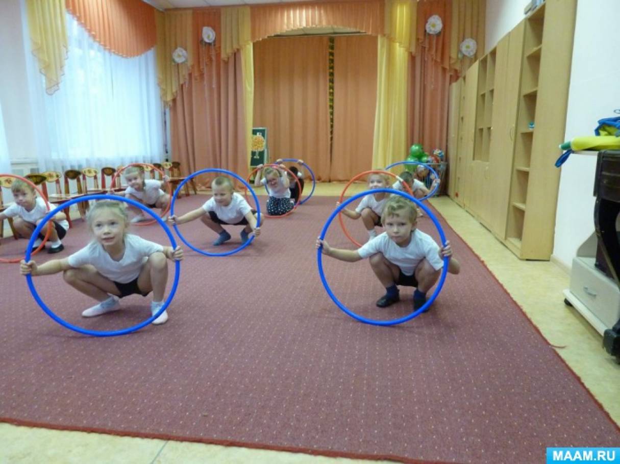 Физическое развитие ребенка с обручем