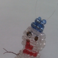 Новогодняя поделка «Снеговик из бисера»