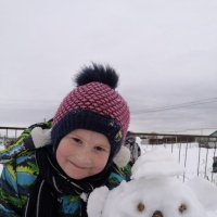 Фотоотчёт «Как мы лепили снеговиков и создавали снежные постройки!»