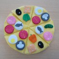 Многофункциональное игровое пособие из фетра «Занимательная пицца»