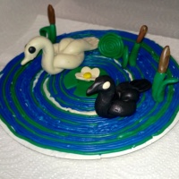 Сидим дома с пользой. Мастер-класс по пластилинографии с пошаговым фото «Лебеди на озере»